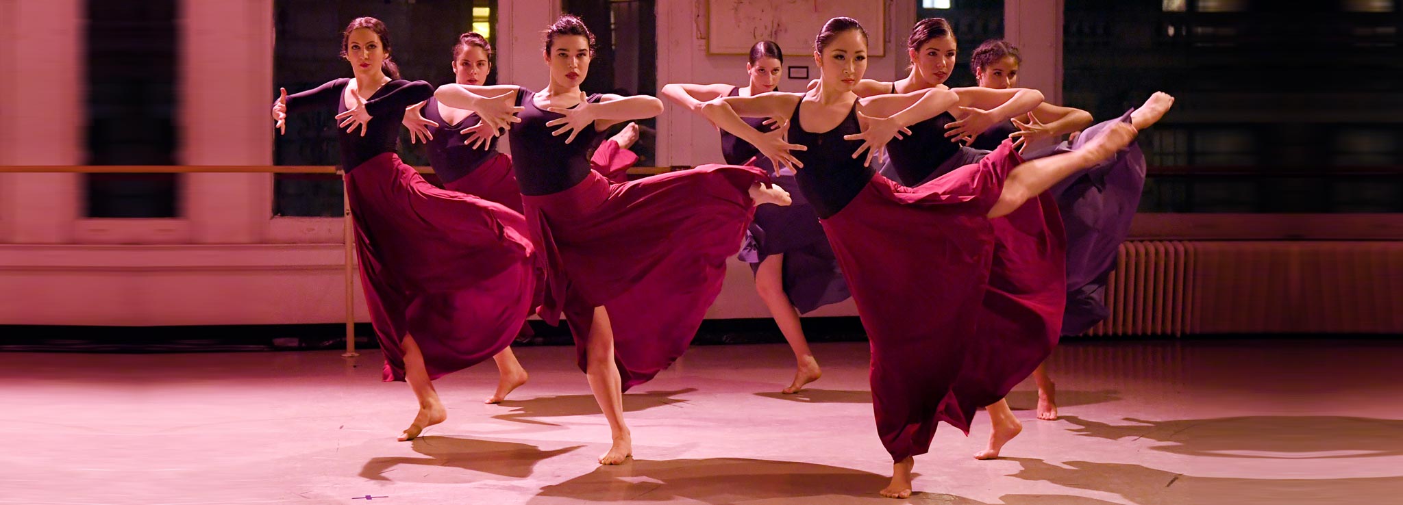 "photograph of summer study dance students performing in the studio - group of 7 barefoot dancers on one foot