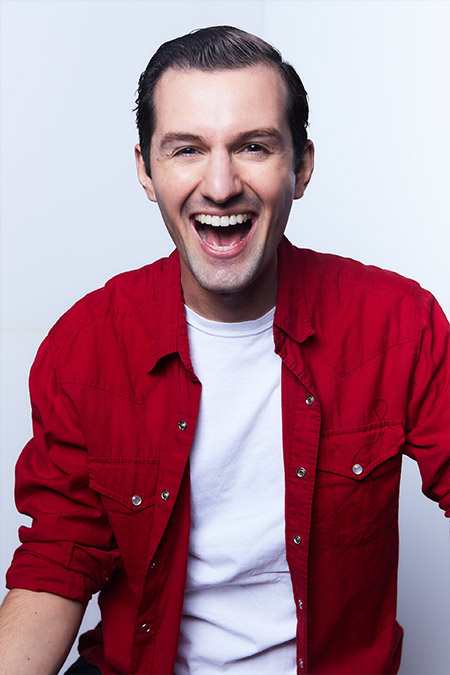 Headshot Felipe Galganni - short dark hair is smiling broadly.