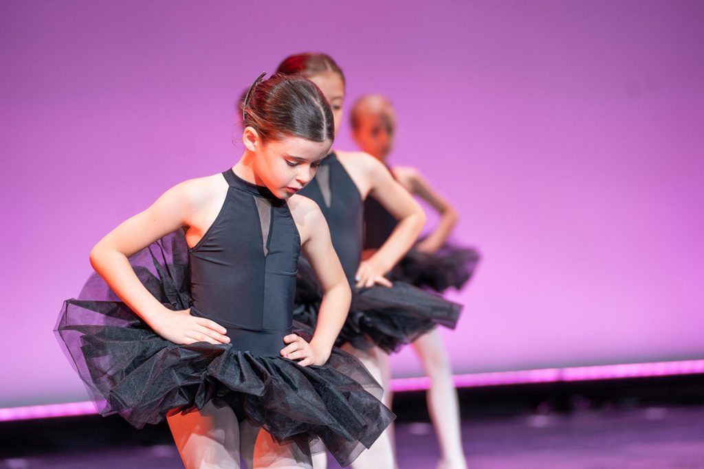 Steps Academy ballet dancers on stage in black dance costumes with black tutus