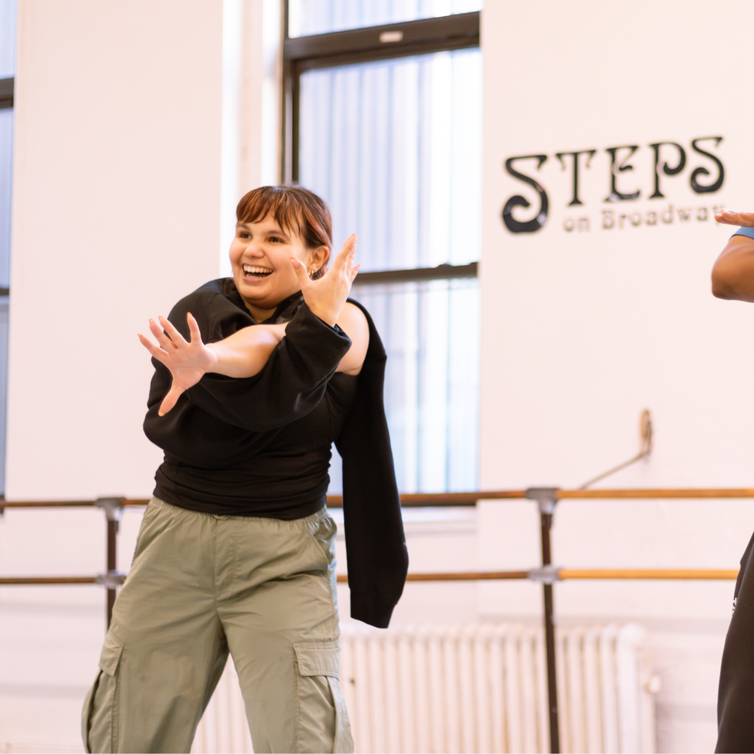 Dance student in black and tan taking an Adult Basic Dance Workshop at Steps
