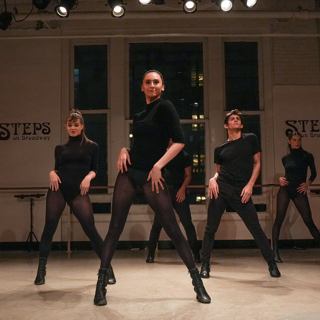 Several dancers performing in an Industry Showcase at the culmination of a Professional Performance Workshop at Steps on Broadway.