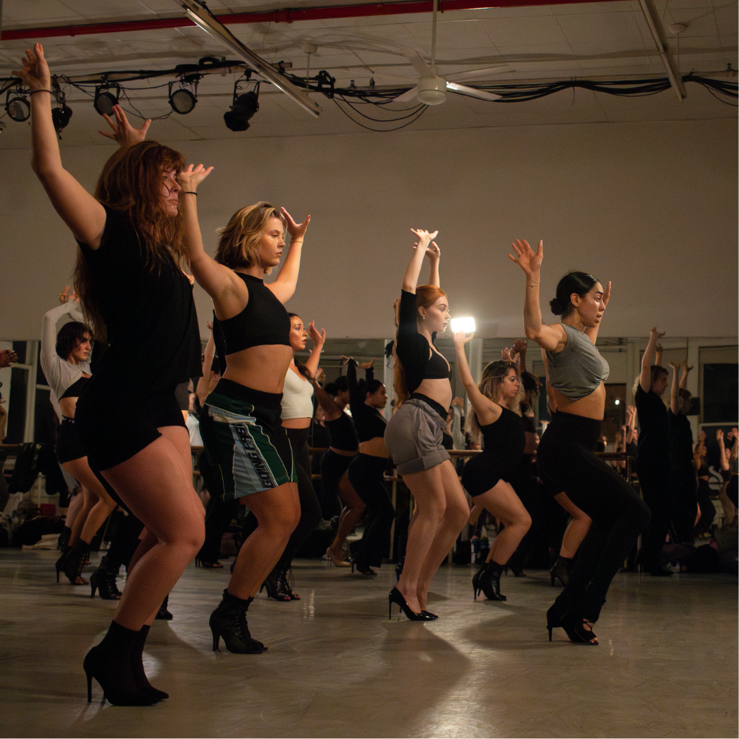 Several dancers in a class/studio thater in a Professional Work Session at Steps on Broadway.